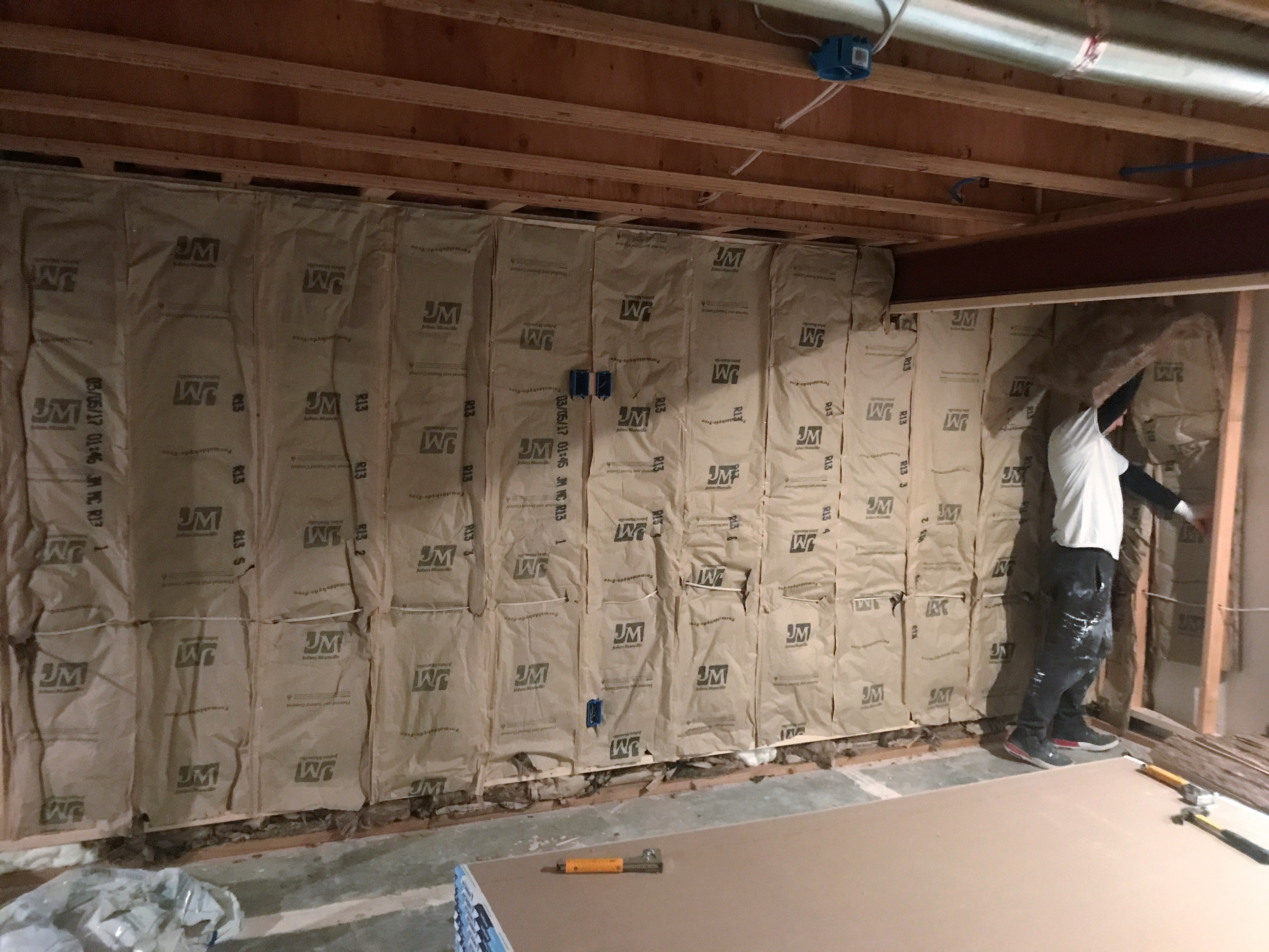 Adding insulation on the framed basement walls