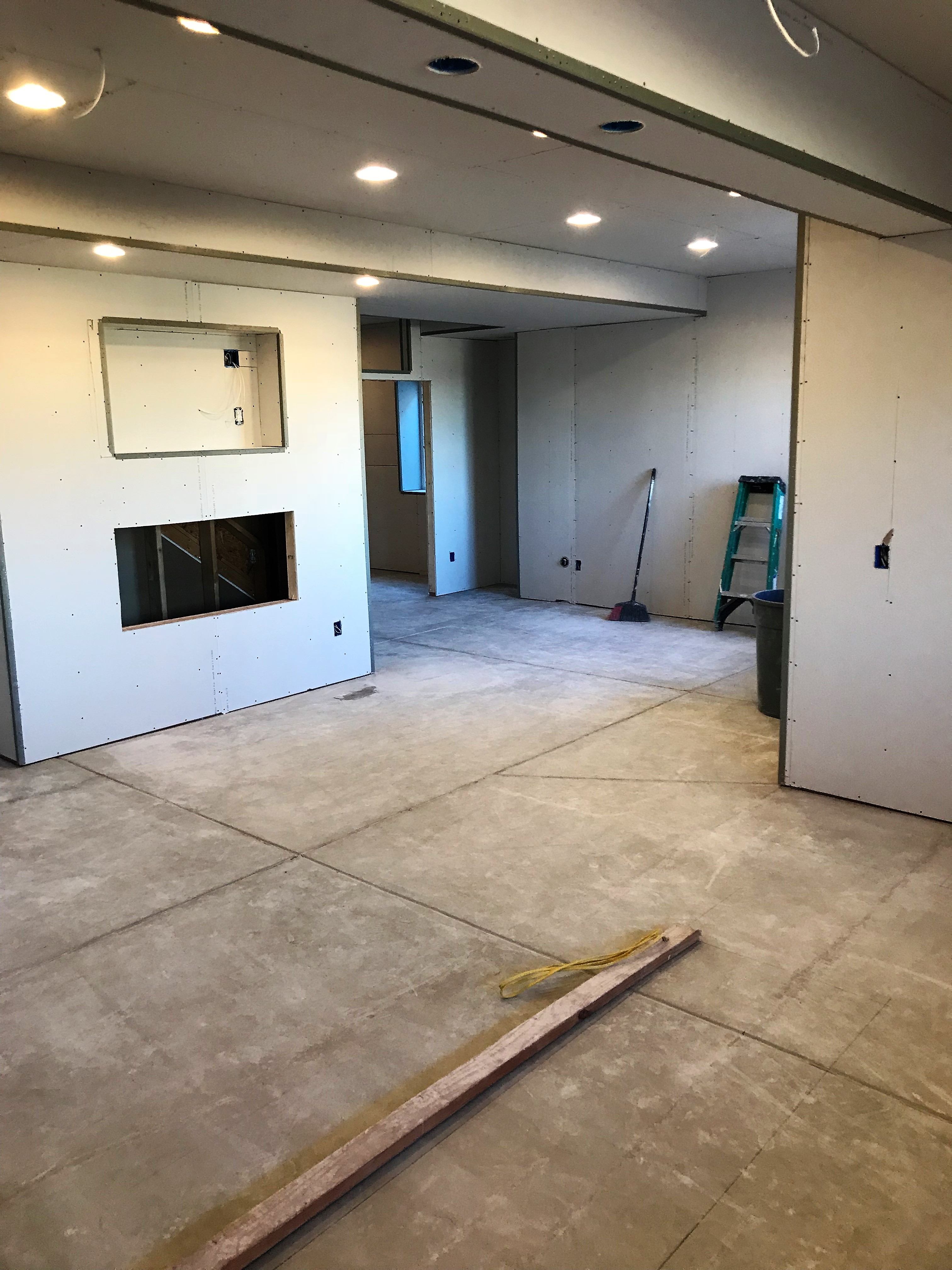 Drywall has been installed and no trash in the area