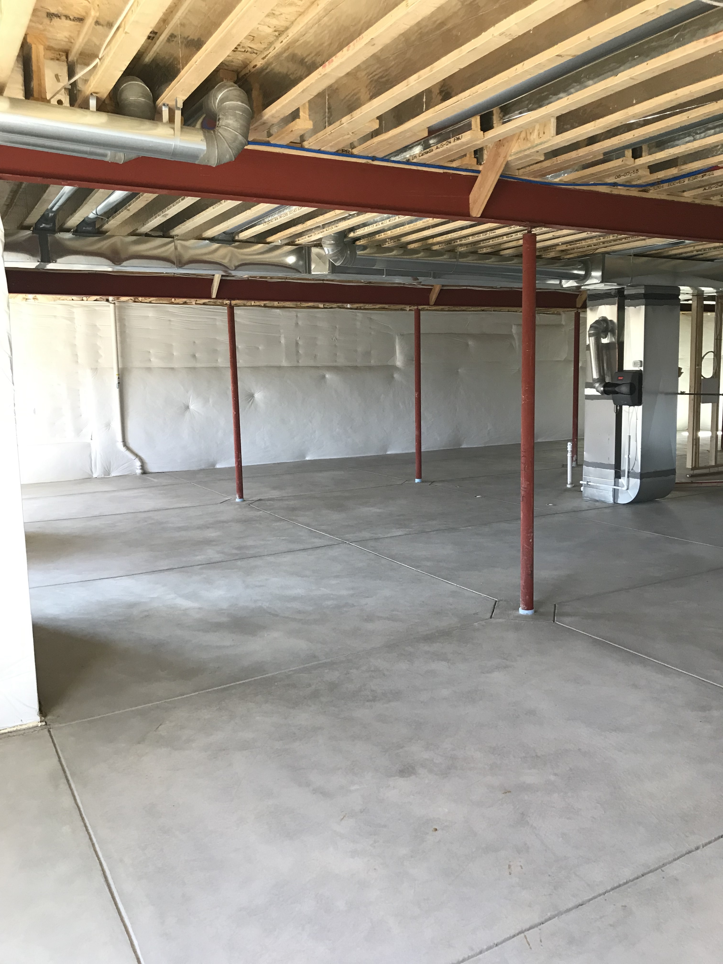 Unfinished basement with a furnace