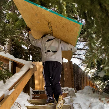 carrying osb sheets up the staircase
